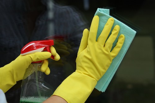 Professional upholstery cleaning for a fabric sofa in an E2 home