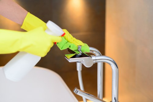 Sustainable carpet cleaning team managing recyclable waste in E2