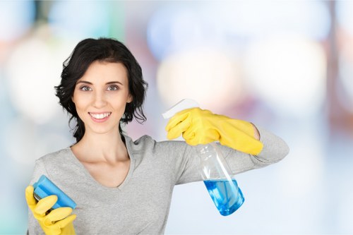 Local cleaning team carrying out regular cleaning in an E2 kitchen